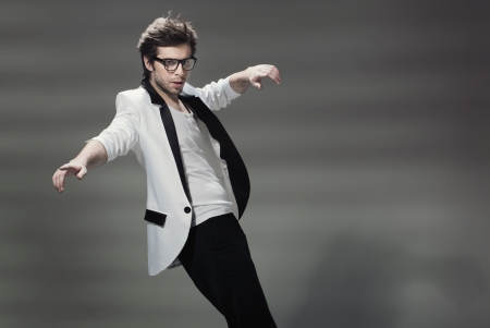 Handsome young guy wearing tuxedo jacketの写真素材