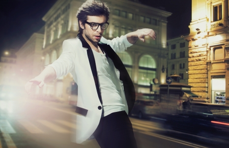 Young fashionable man on the street の写真素材