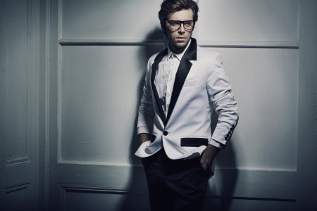 Handsome young man and his great outfitの写真素材
