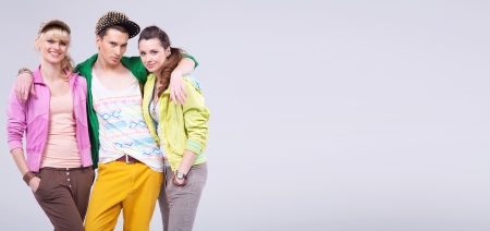 Relaxed attractive teenagers hugging and smilingの写真素材