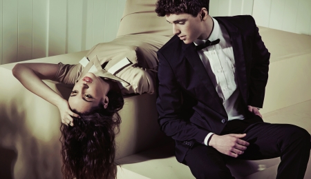 Alluring lady resting next to her handsome boyfriendの写真素材