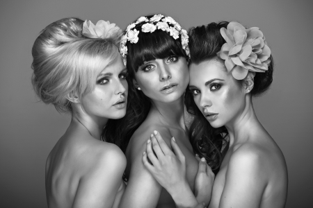 Black&white photo of three cute ladiesの写真素材