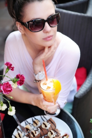 Calm brunette woman in the cafeの写真素材