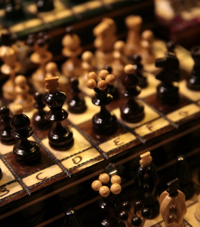Photo of a lot of wooden chess piecesの写真素材