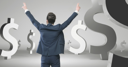 Young businessman making a big fortuneの写真素材