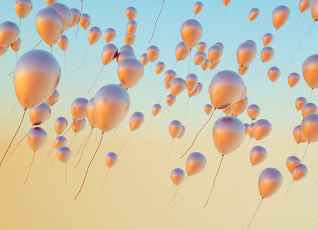 Fine photo of the flying golden balloonsの写真素材