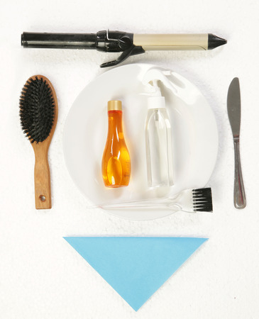 Hair accessories on the white dinner plateの写真素材