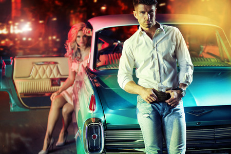 Handsome guy with his sensual girlfriend in the backgroundのeditorial素材
