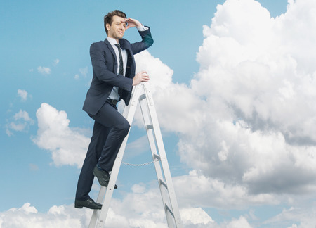 Succesful man on the top of the businessの写真素材