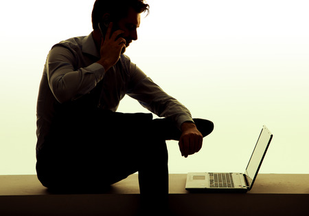 Portrait of the young tired programmerの写真素材