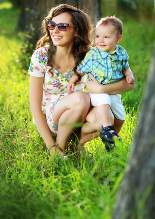Brunette mom with her lovely kidの写真素材