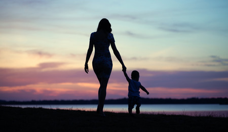 Fine photo the mom walking with babyの写真素材