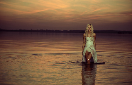 Water nymph walking in the riverの写真素材