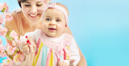 Adorable woman with her cute childの写真素材
