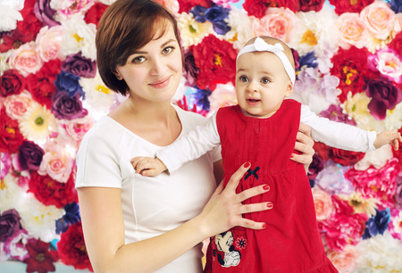 Pretty mom with cute babyの写真素材