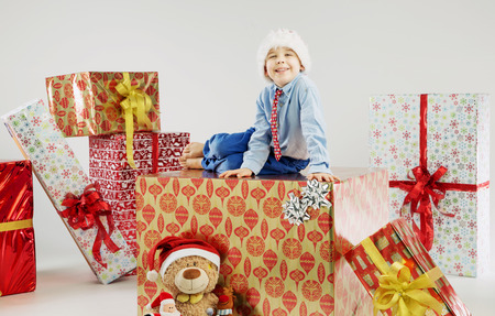 Portrait of a small boy on the large giftの写真素材