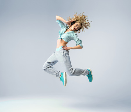 Fine shot of the jumping womanの写真素材