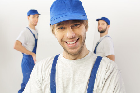 Closeup portrait of three buildersの写真素材