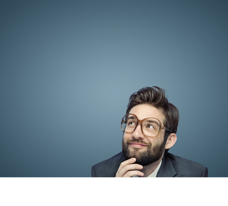 Portrait of an employee consider his own business