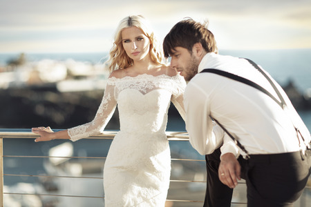 Young beautiful marriage couple in the exotic areaの写真素材