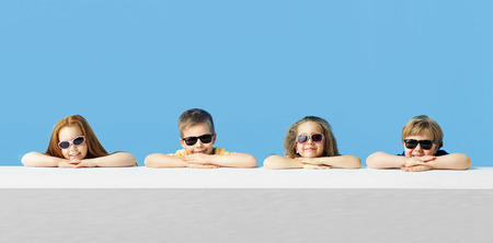 Little cute kids relaxing togetherの写真素材