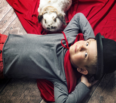 Portrait of a happy little magician manの写真素材