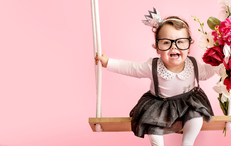Portrait of a cute toddler wearing eyeglassesの写真素材