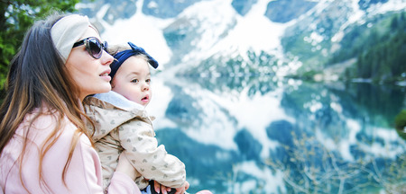Mother with a little daughter on the vacation tripの写真素材