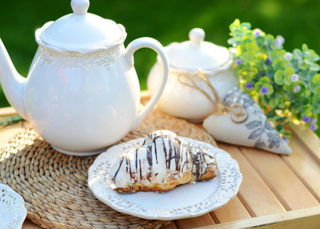 Image of a sweet breakfast in the summer gardenの写真素材