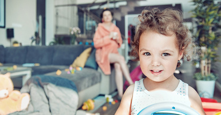 Mom and little daughter during a casual dayの写真素材