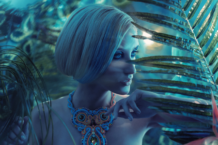 Portrait og a sensual blond lady in the tropicsの写真素材