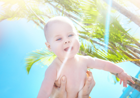 Portrait of a cute son carried by his mother