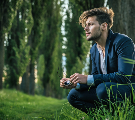 Young, calm guy enjoying the summer timeの写真素材