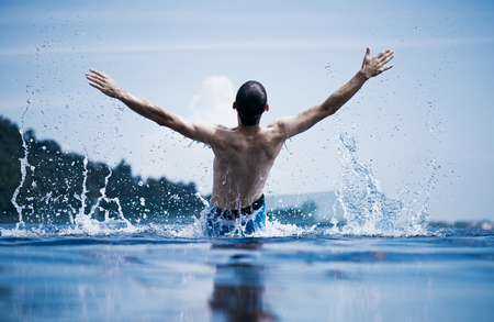 Young guy enjoying the vacation in paradiseの写真素材
