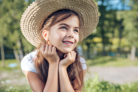 Portrait of a pretty, cheerful girlの写真素材