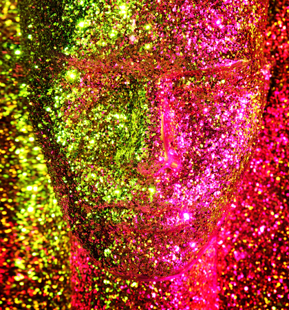 Glittering, golden head of a mannequin sculptureの写真素材