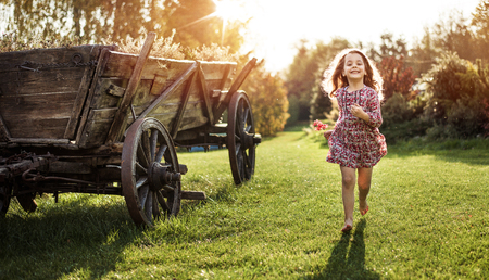 Portrait of a cute, little girl on a farmの写真素材