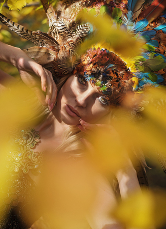 Portrait of a beautiful woman wearing a magnificent chapletの写真素材