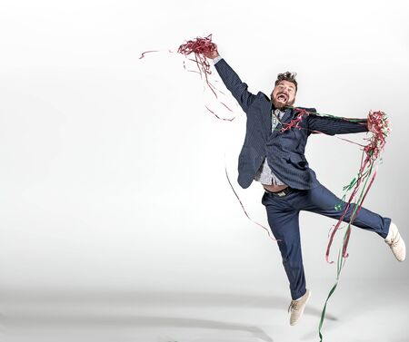 Plump man in a jumping pose