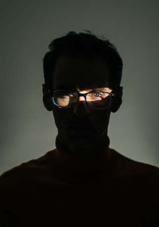 Studio shot of a serious handsome manの写真素材