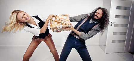 Funny hipster couple posing on white backgroundの写真素材