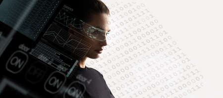 Concept of future technology or entertainment system, virtual reality. Female portrait lit by HUD interfaceの写真素材