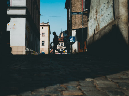 silhouette of the persons on the streetの写真素材