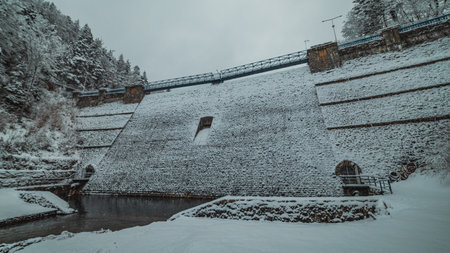 dam in winter covered by the snowの写真素材
