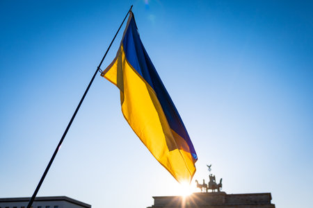 Ukrainian flag flying against the blue skyの写真素材