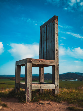wooden chair on the hillsの写真素材