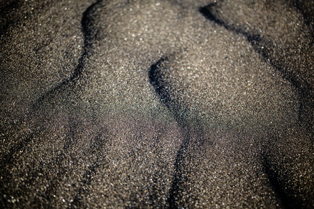 Black volcanic sand (shallow depth of field)の写真素材