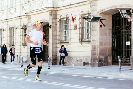 WARSAW, POLAND - SEPTEMBER 30, 2018: Runner at 40th Warsaw Marathon. Photo with shallow depth of field.のeditorial素材