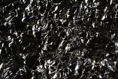 Crinkled tinfoil, aluminum foil, wrinkled aluminum foil photo.