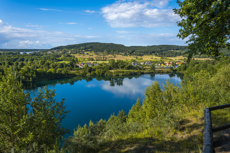Charming emerald lake on the island of Wolin in Wapnicaの写真素材